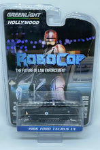 Load image into Gallery viewer, Greenlight 1/64 1986 Ford Taurus LX - RoboCop
