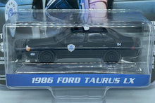 Load image into Gallery viewer, Greenlight 1/64 1986 Ford Taurus LX - RoboCop
